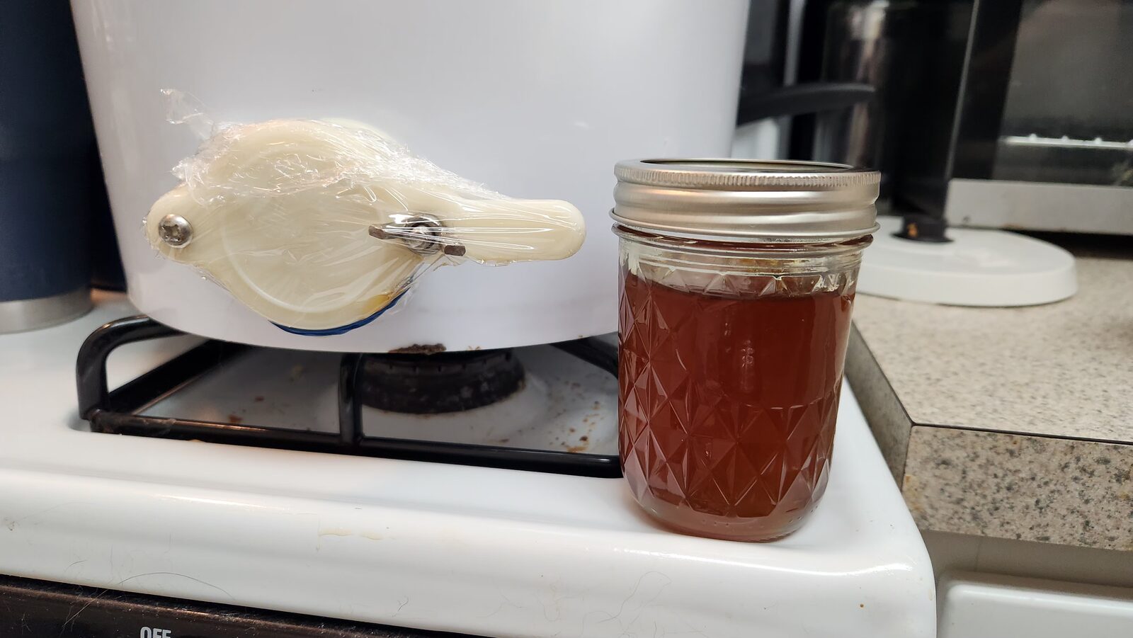 A finished jar of honey, ready for testing